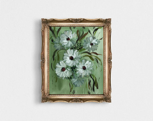 White daisy print on green in an ornate gold frame.