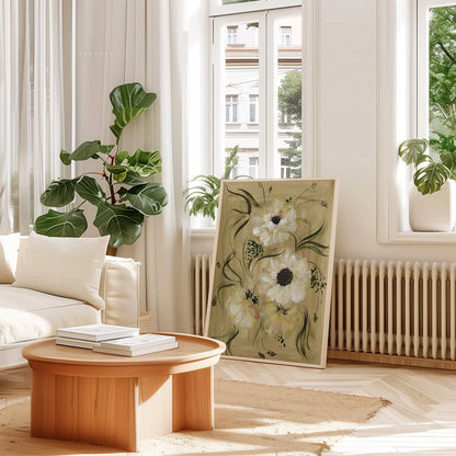 Large white anemone print leaning beside a radiator in a bright living room with houseplants.
