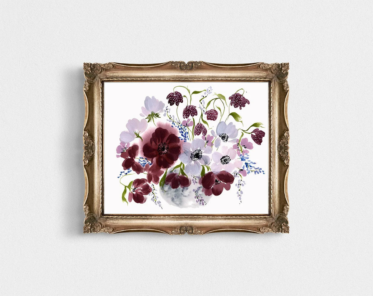 Burgundy and pale purple floral vase print in an ornate gold frame.