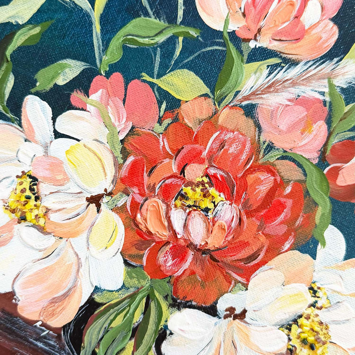 A close-up of a floral painting depicting a vibrant floral bouquet with a central red peony, surrounded by pink tulips, white daisies with yellow centers, and green leaves on a dark blue background.