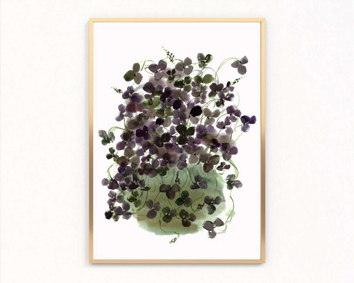 Gold-framed print of dark purple clover leaves spilling from a pale green vase.