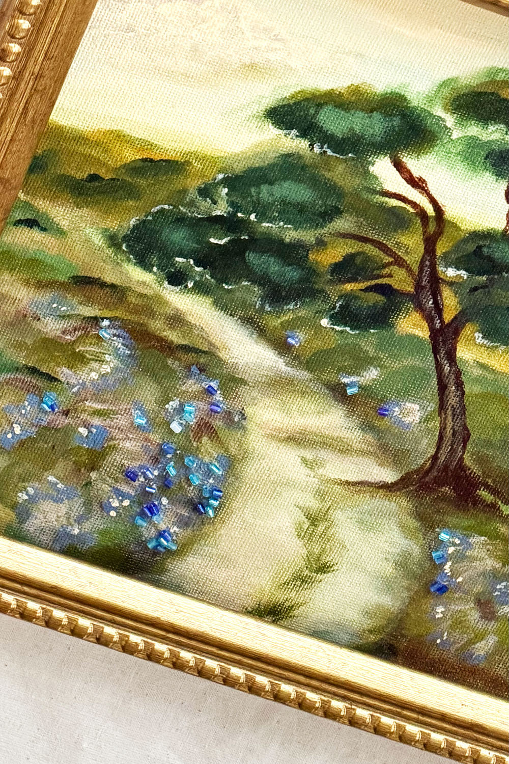 Pastoral landscape painting in a gold Frame