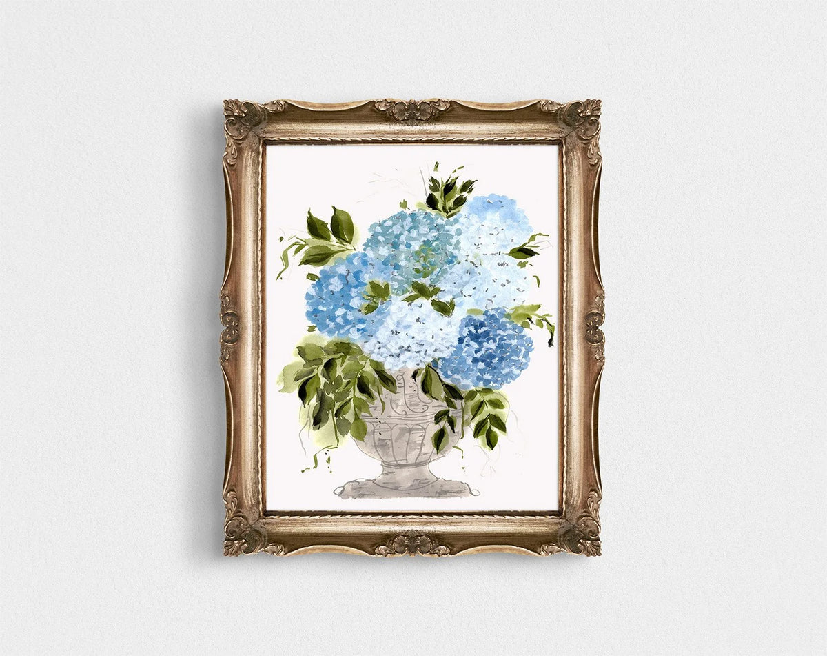 Blue and white hydrangea vase print in an ornate gold frame.