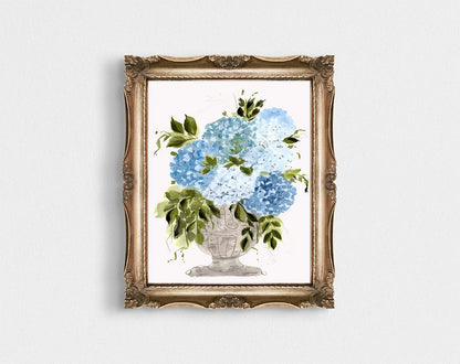 Blue and white hydrangea vase print in an ornate gold frame.