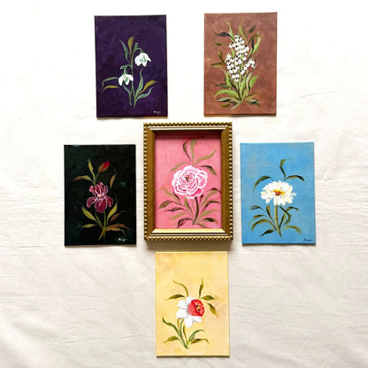 Six originals of flower of the month comes in a beaded gold frame.