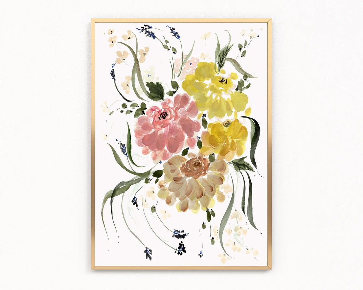 Gold-framed print of pink, yellow and beige ranunculus with slender leaves and blue sprigs.