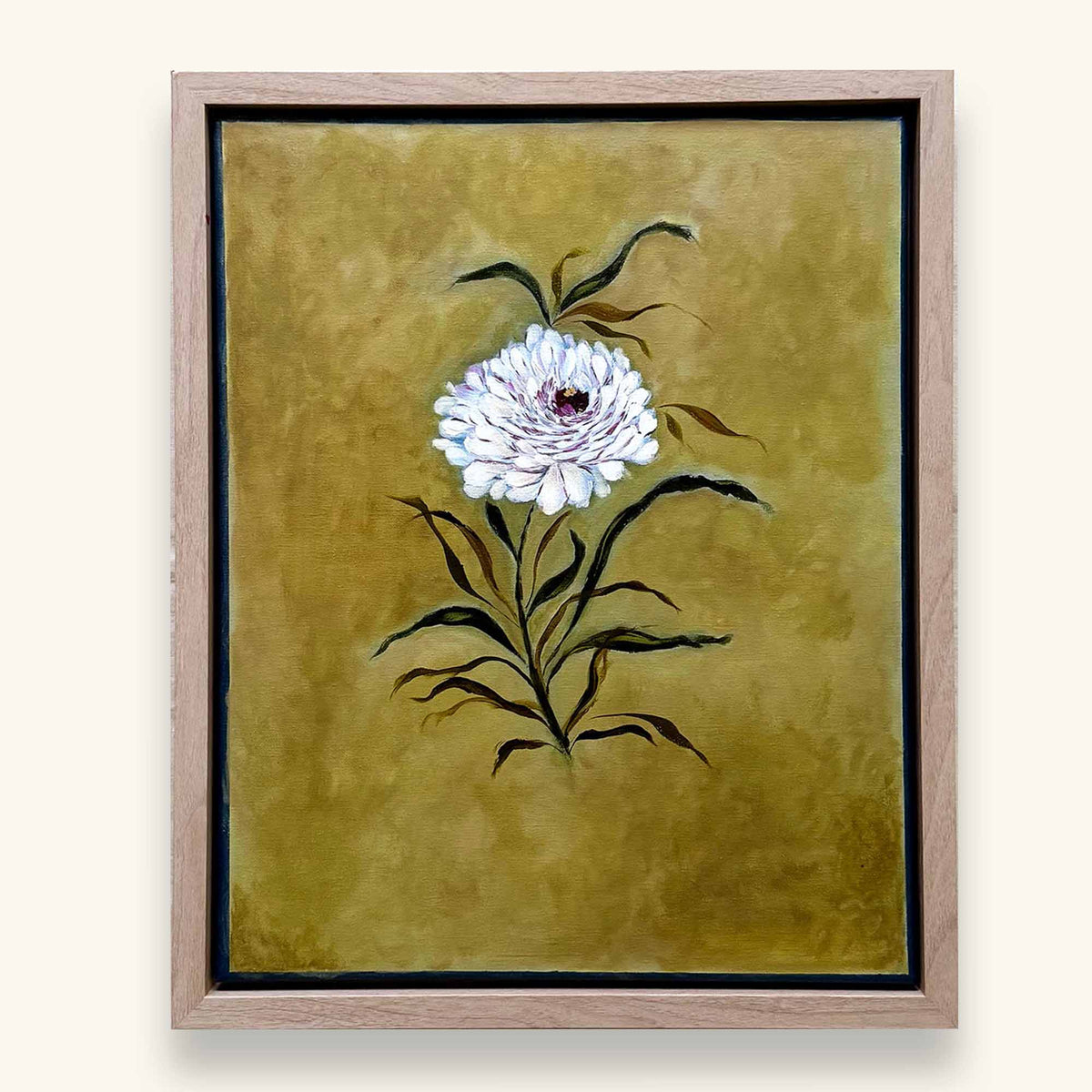 A framed original floral art print featuring a white dahlia with green leaves on a textured olive-yellow background. Perfect addition for a library nook decor