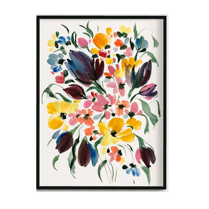 Black-framed print of dark purple tulips surrounded by yellow, pink and blue blossoms and green leaves.