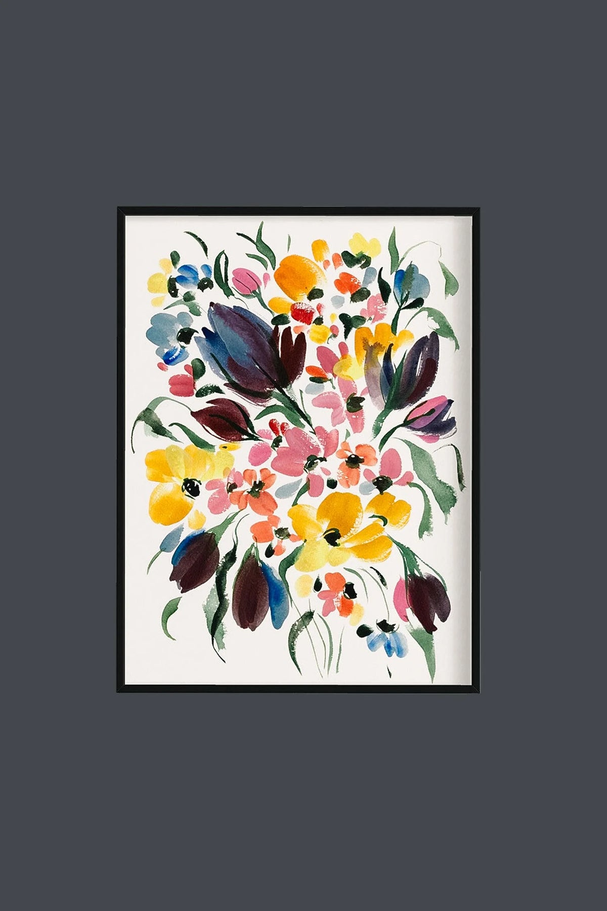 Dark purple tulip and colorful floral print in a black frame on a charcoal wall.