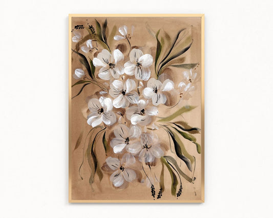 A framed botanical art print featuring white flowers with green leaves on a warm beige background, enclosed in a light wood frame and shown against a plain white wall.