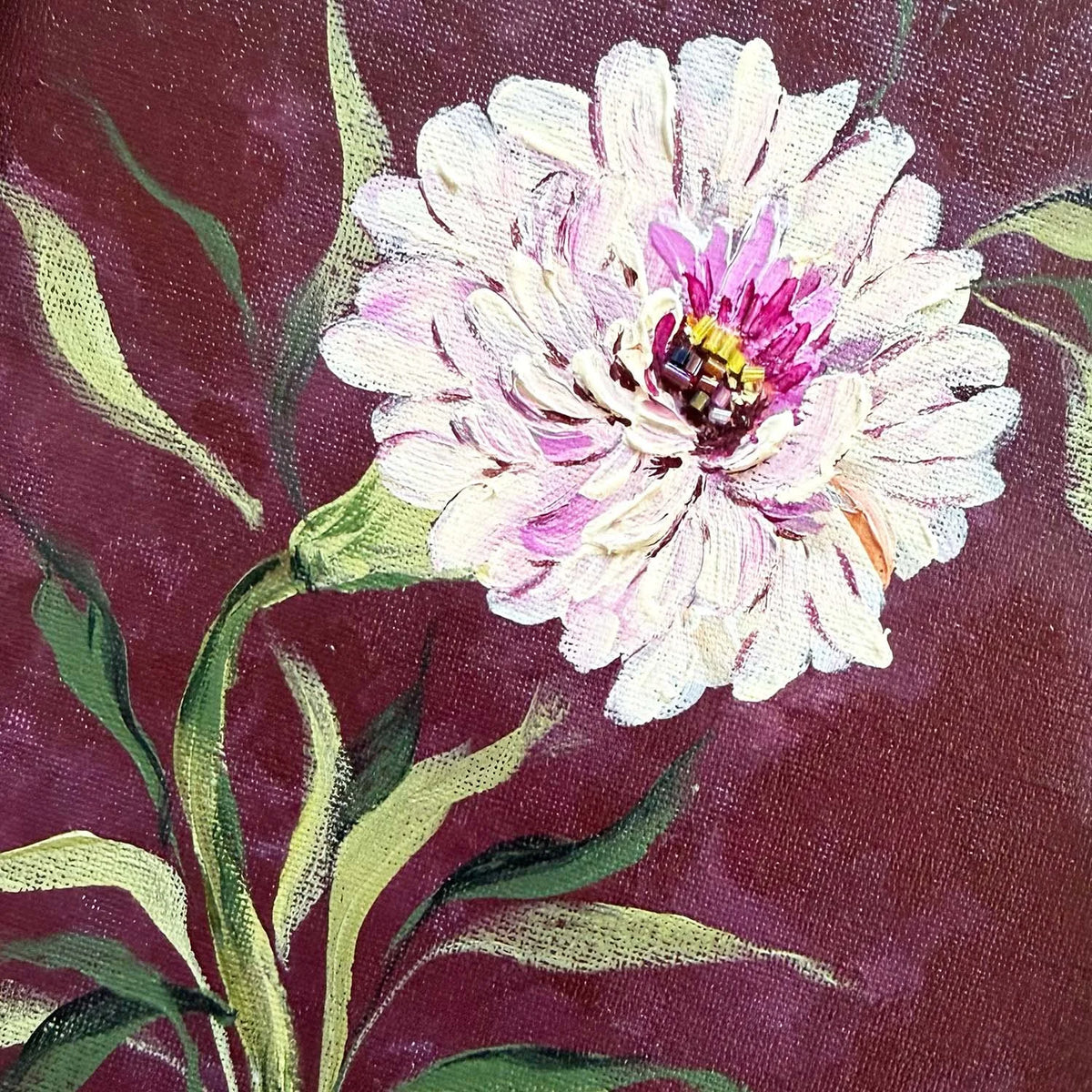 A close-up painting of a large white and pink daisy with green leaves on a deep burgundy background, showing visible canvas texture.
