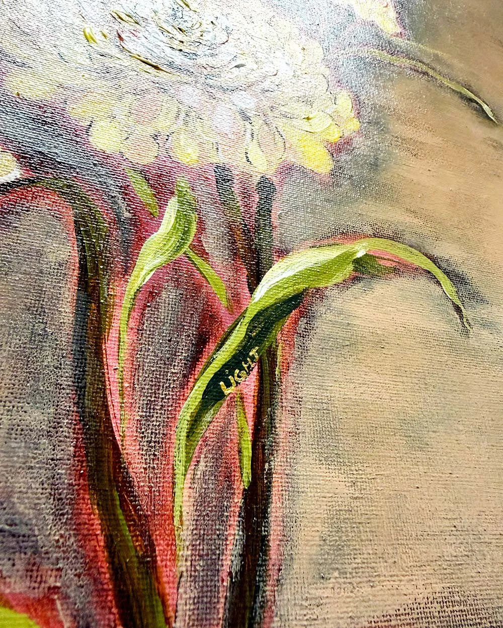 Close-up of a textured painting depicting green leaves and stems with a soft-focus background in beige, gray, and red tones.